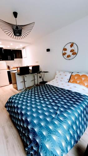 Ένα ή περισσότερα κρεβάτια σε δωμάτιο στο Studio Urbain Spa & Relaxation