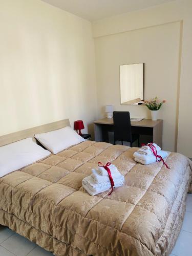 Ένα ή περισσότερα κρεβάτια σε δωμάτιο στο B&B il Tulipano