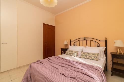 Postel nebo postele na pokoji v ubytování Elegance Villas - Villa Andon & Villa Yiota