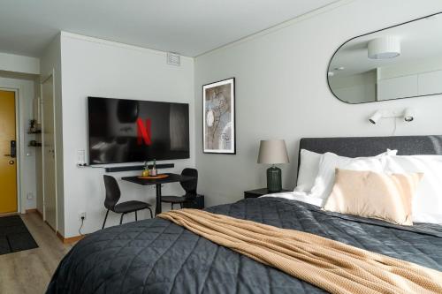 Postel nebo postele na pokoji v ubytování Guestly Homes - Modern Studio Apt