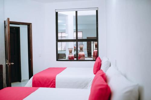 Postel nebo postele na pokoji v ubytování Casa Franlus apartamento 1 planta baja