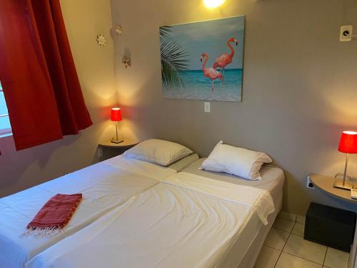 Ένα ή περισσότερα κρεβάτια σε δωμάτιο στο 14a Casa Prikichi