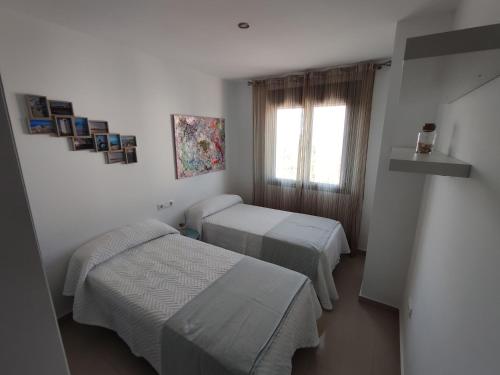 Apartamentovistasconil, ático con piscina, jardín, pista de pádel y solárium