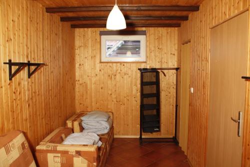 a room with boxes and a ladder in it at The Jolly Man in Vilnius