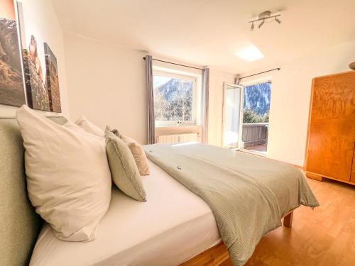 Katil atau katil-katil dalam bilik di Alpine Apartments St-Sigmund