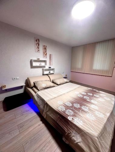 a bedroom with a large bed in a room at Emanuela Sea And Luxury in Kavala
