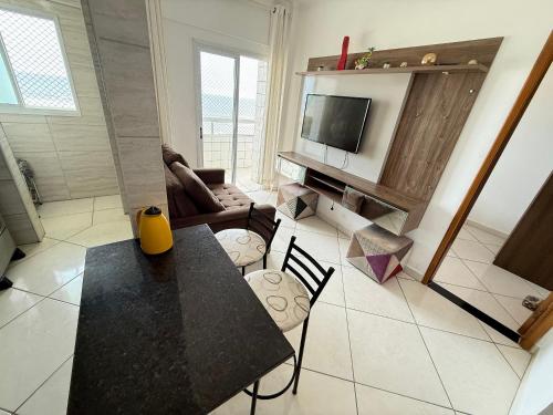 TV a/nebo společenská místnost v ubytování Pé Na Areia Praia do Maracanã II