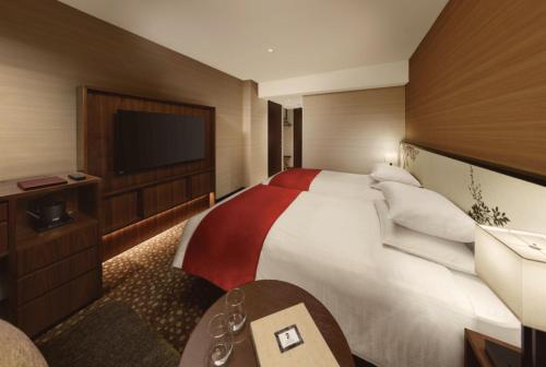 Katil atau katil-katil dalam bilik di Shiba Park Hotel