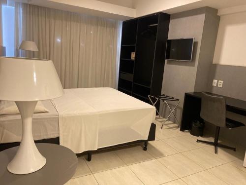 Postel nebo postele na pokoji v ubytování Loft 3 Edf Celita Franca Business e flat