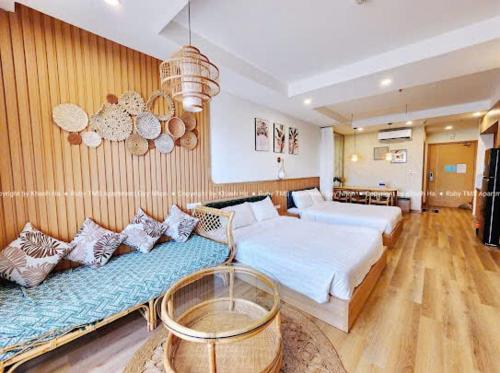 Postel nebo postele na pokoji v ubytování RUBY LUXURY SEA APARTMENT- TMS Quy Nhon