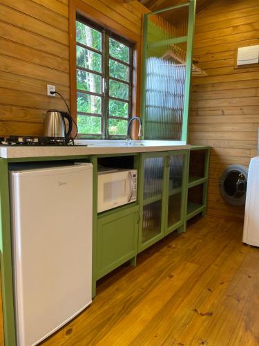 Kuchyň nebo kuchyňský kout v ubytování Chalé alievi