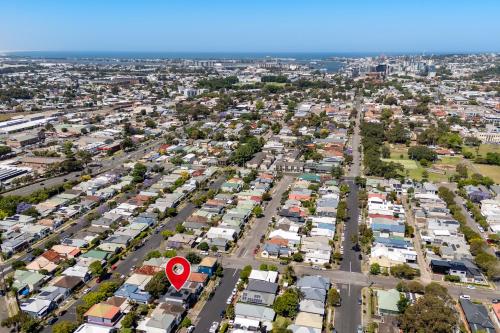 an aerial view of a city with houses at Newcastle Escape 4-Bedroom House in Hamilton