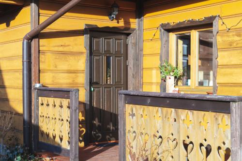 Balkón nebo terasa v ubytování Drewniany Domek