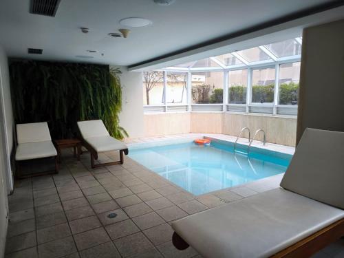 Bazén v ubytování Inter Paulista - Flat Hotel nebo v jeho okolí