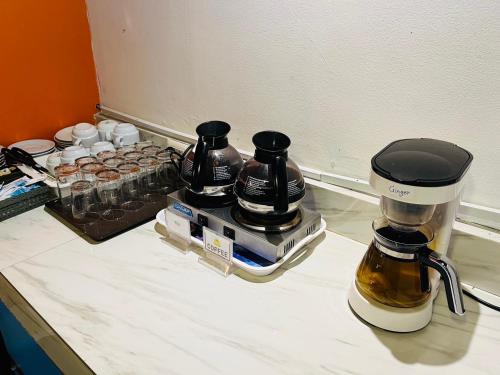 Kaffe- og tefaciliteter på Ocean View Treasure Residence