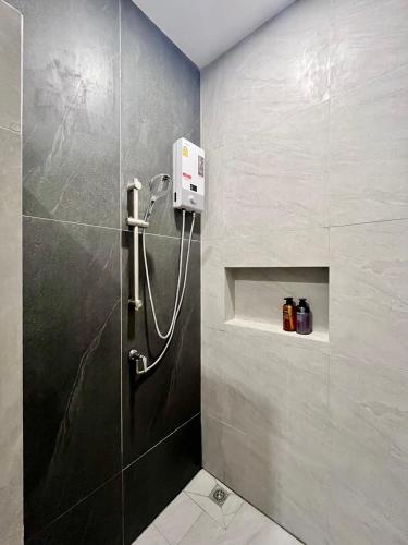 a shower stall in a bathroom with a shower at HS3-Hidden Space Private Pool Villa-บางแสน in Ban Hua Khao Sammuk