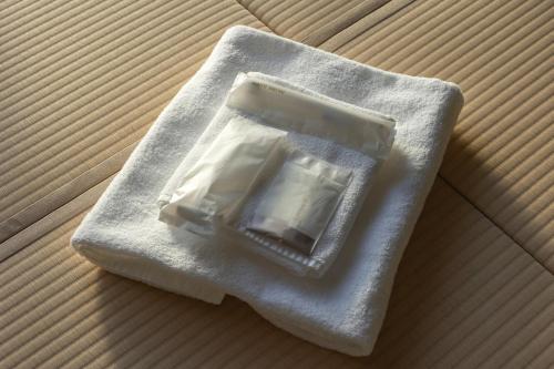 a block of soap sitting on top of a napkin at Cozy Stay Sapporo Hongodori 405 in Sapporo