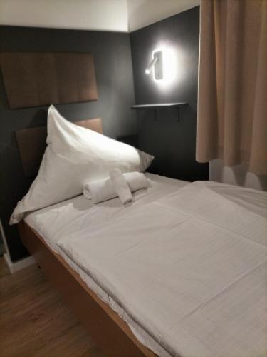 Cama o camas de una habitación en Niehler Hotel