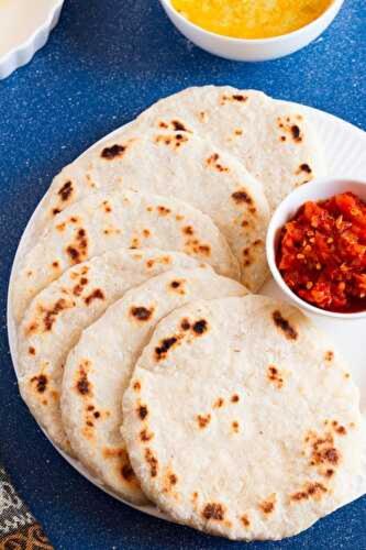 a plate with two tortillas and a bowl of salsa at Four Points Resort - Anuradhapura in Anuradhapura