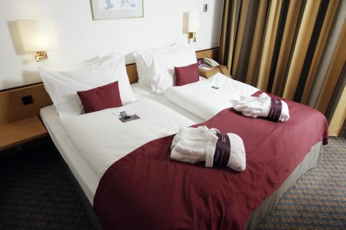 Ένα ή περισσότερα κρεβάτια σε δωμάτιο στο Mercure Hotel Köln City Friesenstraße