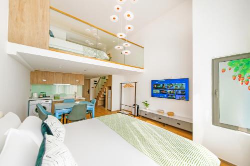 Katil atau katil-katil dalam bilik di Zhujiajian Chunyu Qiushe Apartment
