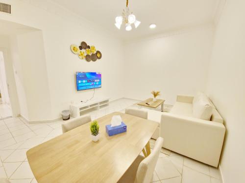 TV a/nebo společenská místnost v ubytování HARF22-101-02 2br apt in AD