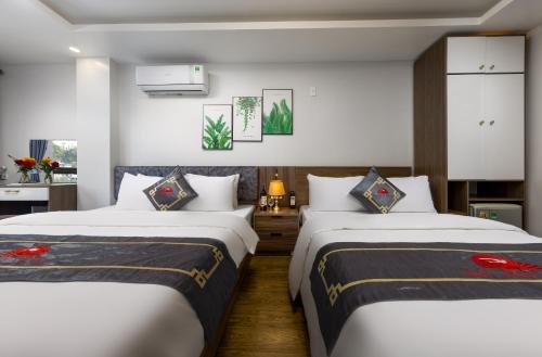 Katil atau katil-katil dalam bilik di Bao Phuc Hotel