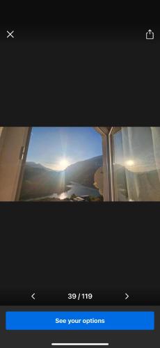 a view from an airplane window of a sunset at Borbardha the 7 xhuxhat in Tropojë