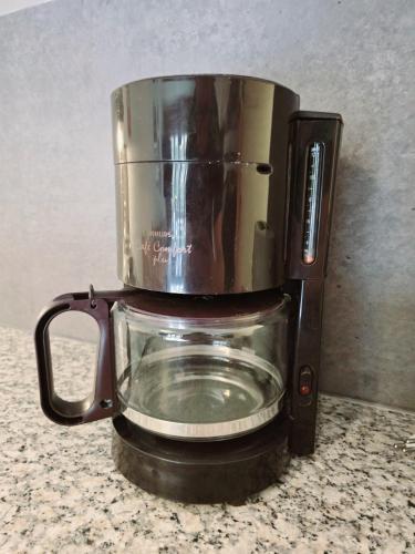 a coffee maker sitting on top of a counter at L'écrin de Torgon aux Portes du Soleil in Torgon