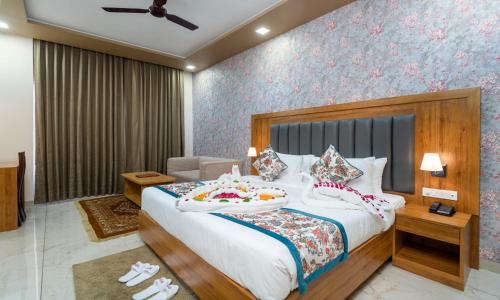Hotel Kaushal Regencyにあるベッド