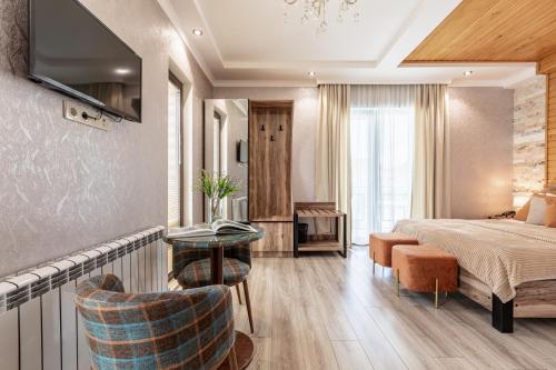 Postel nebo postele na pokoji v ubytování Hotel Gold Tower