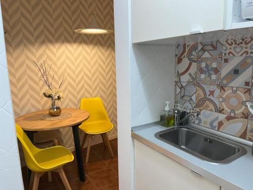 Kuchyň nebo kuchyňský kout v ubytování Regueira Gold com terraço