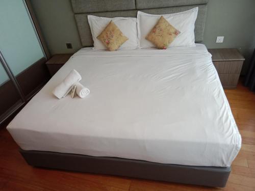 Postel nebo postele na pokoji v ubytování Vortex Suites KLCC By Farysha