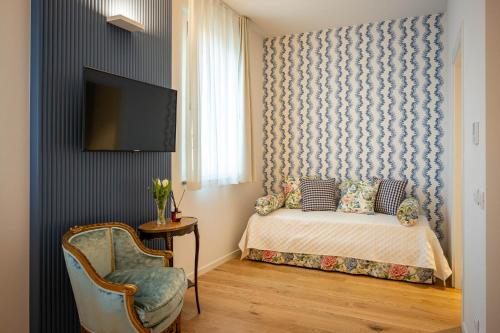 Postel nebo postele na pokoji v ubytování Albergo del Cuore