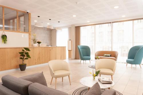 Un lugar para sentarse en Zenitude Hôtel Résidence Pau