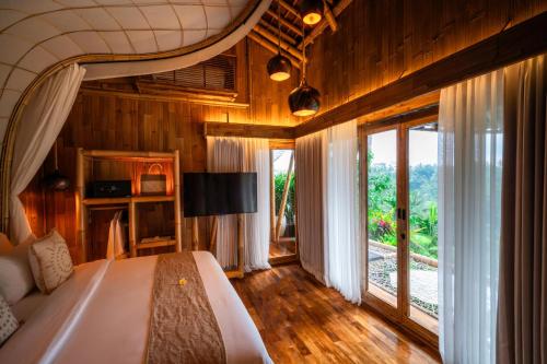 Bambootel Sawah Viewにあるテレビまたはエンターテインメントセンター
