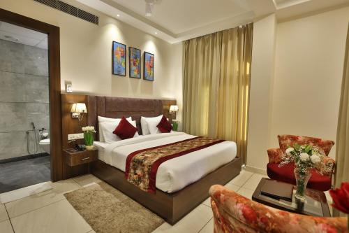 Katil atau katil-katil dalam bilik di Hotel Ramaya Inn