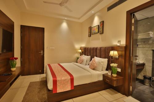 Katil atau katil-katil dalam bilik di Hotel Ramaya Inn