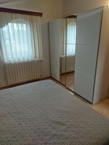 Ένα ή περισσότερα κρεβάτια σε δωμάτιο στο Apartman Andela
