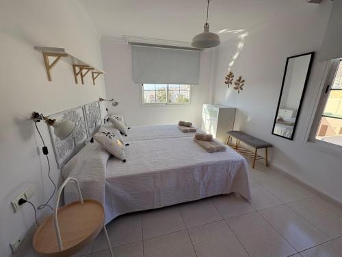 Postel nebo postele na pokoji v ubytování Duplex La Rosa