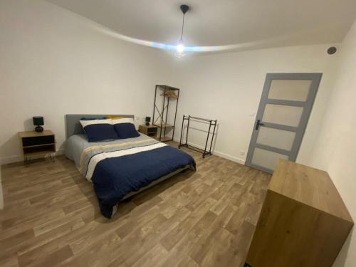 Katil atau katil-katil dalam bilik di Appartement 56m Hayange