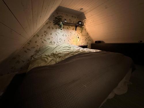 Postel nebo postele na pokoji v ubytování Hagbards By Gårdspensionat