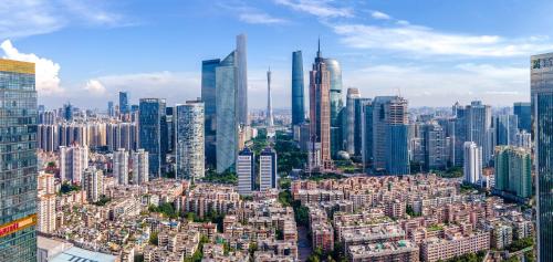 a view of a large city with many tall buildings at Guangzhou Xi Yun - Lai Xizhou Hotel-Free shuttle bus during Canton Fair in Guangzhou