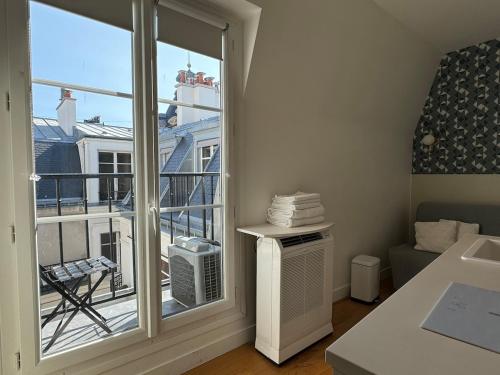 Photo de la galerie de l'établissement Studio Trocadéro devant le Métro Passy, à Paris