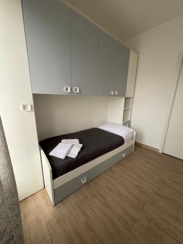 Ένα ή περισσότερα κρεβάτια σε δωμάτιο στο Serafino Lodge