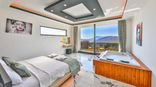 En eller flere senge i et værelse på Luxury 2 Bedroom Villa - 1600