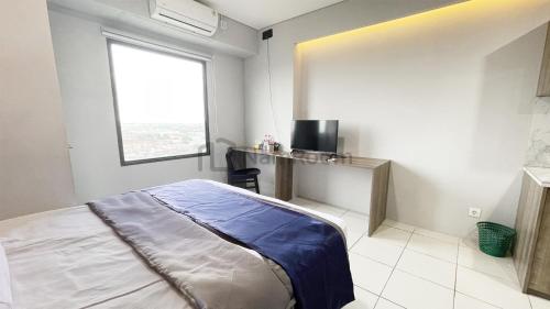 Gallery image of Apartement Riverdale By NamRoom in Tanahbaru