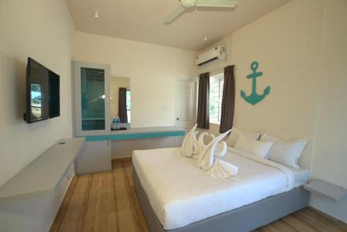 Postel nebo postele na pokoji v ubytování Lazo Avarta Resort and Convention Centre Pondicherry