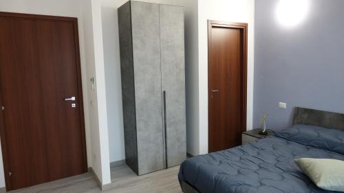 Postel nebo postele na pokoji v ubytování Podere Monfalcone guest house
