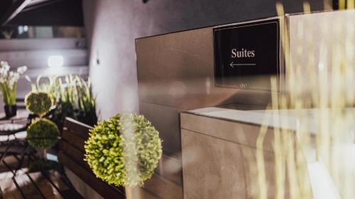 a store window with a sign that reads smiles at O&O Group - The SeaGate Estate suites - Suite 1 in Rishon LeẔiyyon